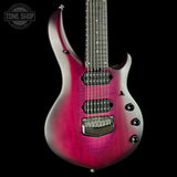 A close-up studio shot of an electric guitar body against a black background, showing a vibrant magenta-pink to silver gradient finish with a visible wood grain texture. The brand logo 'TONE SHOP' is visible in the top-left corner.