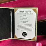 Gibson Custom Certificate of Authenticity on a red background