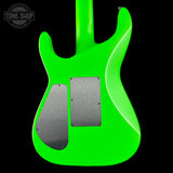 The back of a bright neon green electric guitar body with two brushed silver metal pickups, shown against a solid black background. A Tone Shop watermark is visible in the top-left corner.