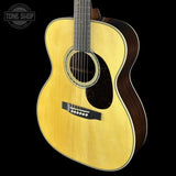 Front angle of Martin Custom Shop 28/45 Style 000 Adirondack/Wild Grain East Indian Rosewood.