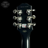Guitar headstock with tuning pegs on a black background, featuring the Tone Shop logo.