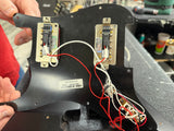 Underside of electronics and pickguard.