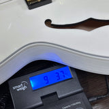 Gibson Custom 1959 ES-355 Bigsby Varitone Alpine White Ultra Light Aged on scale displaying weight.