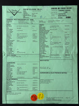 Green document with text and a logo on a black background
