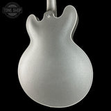Back angle of Gibson Custom Shop 1959 ES-355 Reissue Diamond F-Holes Silver Sparkle Heavy Flake Gloss.
