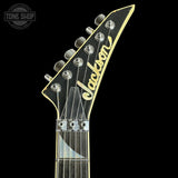 Jackson guitar headstock on a black background with 'Tone Shop' logo.
