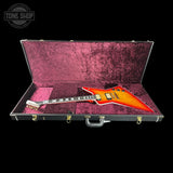 Gibson electric guitar in a pink case with 'Tone Shop' logo.