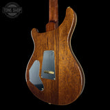 Wooden electric guitar with a visible brand logo in the corner.