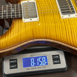 PRS Wood Library DGT 10 Top Livingston Lemondrop Korina / Brazilian RW on scale displaying weight.