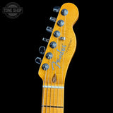 Fender guitar headstock with brand logo on a black background