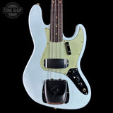 A Fender Stratocaster electric guitar with a pale blue body, a light green pickguard, and a dark brown maple fretboard, shown against a solid black background.