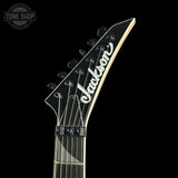 Jackson guitar headstock on a black background with 'Tone Shop' logo.
