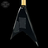 Black electric guitar with a wooden neck on a black background, featuring 'Tone Shop' branding.