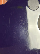 Scratched surface of a guitar body
