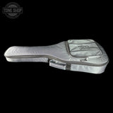 Guitar case with brand logo on a black background