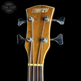 Gretsch guitar headstock on a black background