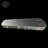 Black guitar case with 'bosch' branding on a black background, featuring the Tone Shop logo.