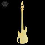 Gold electric bass guitar on a black background with 'Tone Shop' logo.