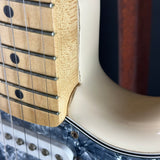 Wear on body of Used 1999 Fender Standard Stratocaster White.