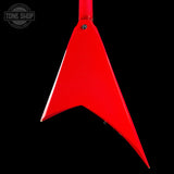 A bright red, angular guitar headstock or decorative headstock-shaped piece shown against a solid black background, with a Tone Shop watermark in the upper left corner.