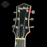 Gretsch guitar headstock on a black background with 'Tone Shop' logo.