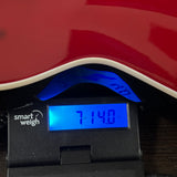 Used Gretsch G5421 Electromatic Jet Club Red on scale displaying weight.