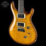 Front angle of PRS Custom 24 Birds of a Feather Limited Honey Gold.
