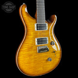 Front angle of PRS Custom 24 Birds of a Feather Limited Honey Gold.