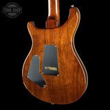 Back angle of PRS Custom 24 Birds of a Feather Limited Honey Gold.