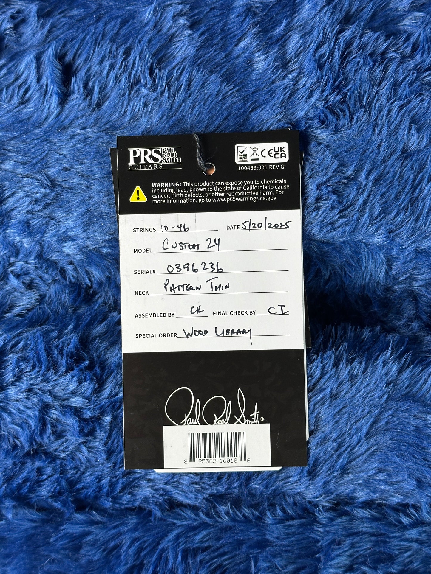 Hang tag for PRS Wood Library Custom 24 Quilt 10 Top Faded Whale Blue.