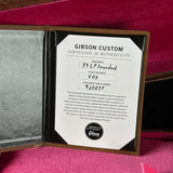 Gibson Custom Certificate of Authenticity on a pink background