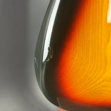 Wear on body of Used 2006 Fender Deluxe Player Strat 3-Tone Sunburst.