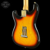 Back angle of Used 2006 Fender Deluxe Player Strat 3-Tone Sunburst.