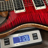 PRS Custom 24 Birds of a Feather Limited Blood Red on scale displaying weight.