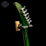 Back of headstock of Used 2025 Gibson Victory Figured Top Iguana Burst.
