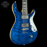 Front angle of Used Kiesel CT624M Blue Quilt Top Black Limba.