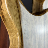 Scratch on back of Used Kiesel CT624M Blue Quilt Top Black Limba.