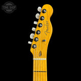 Headstock of Used 2026 Fender 75th Anniversary Cabronita American Pro Telecaster Candy Apple Red.