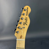 Fender Telecaster guitar headstock on a gray background