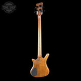 Wooden bass guitar on a black background with 'Tone Shop' logo.