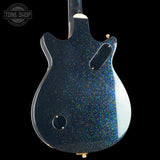 Glossy blue electric guitar body with a black background