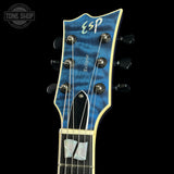 ESP guitar headstock with blue and black design on a black background