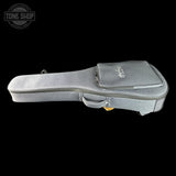 Gray guitar case with a visible brand logo on a black background
