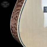 Front detail of Martin Custom Shop 42 Style Torch Motif Adirondack/Master Grade Quilt Maple.