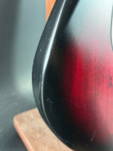 Close-up of a red and black object with a blurred background