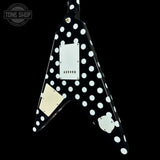 Black guitar body with white polka dots on a black background, featuring 'Tone Shop' logo.