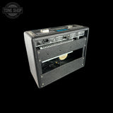 Vintage-style guitar amplifier on a black background with 'Tone Shop' logo.