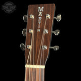 Guitar headstock with 'Martin' branding on a black background