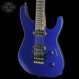 A blue metallic electric guitar with black hardware and a dark fretboard, shown against a solid black background with a Tone Shop watermark in the top-left corner.