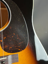 Close-up of an acoustic guitar's soundhole and body